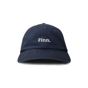 Front view of Navy Blue Acts of Leisure Cap Flat laid over white background