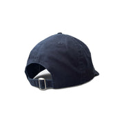 Rear view of Navy BLue Acts of Leisure Cap Flat laid over white background