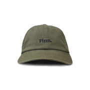 Front view of Dusty Olive Acts of Leisure Cap Flat laid over white background